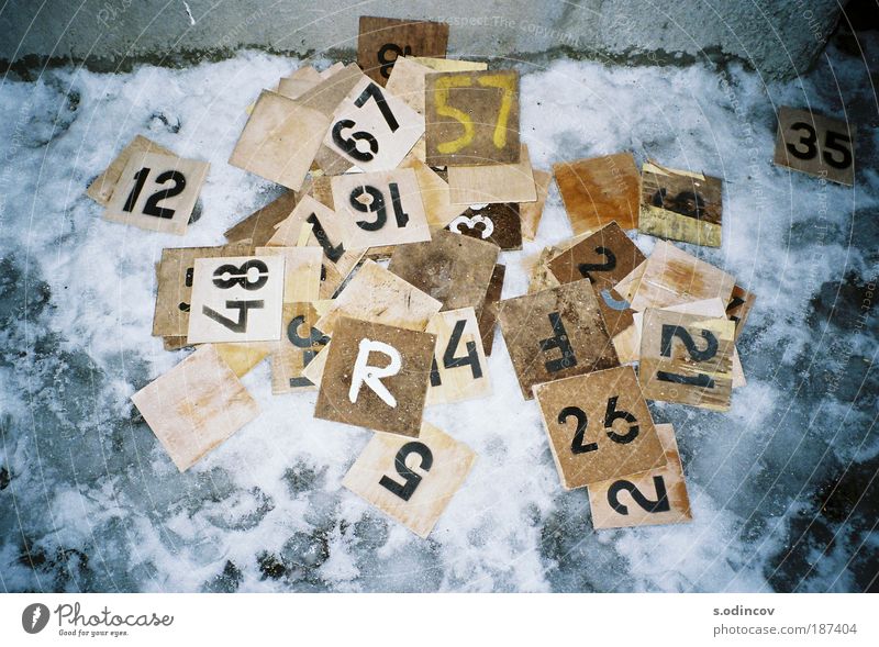 Numbers Board game Piece of paper Wood Sign Characters Digits and numbers Make Trashy Brown Yellow Gray Black White Chaos Colour photo Experimental Abstract