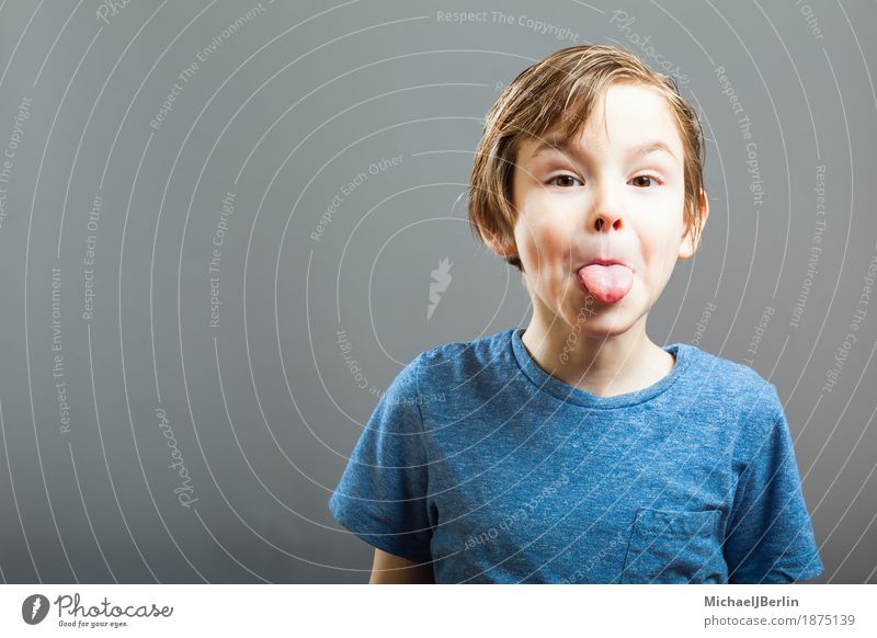 Boy stretches out tongue Joy Child Human being Masculine Boy (child) Infancy Head 1 3 - 8 years Emotions Anger Aggravation Grouchy Brash Tongue Outstretched