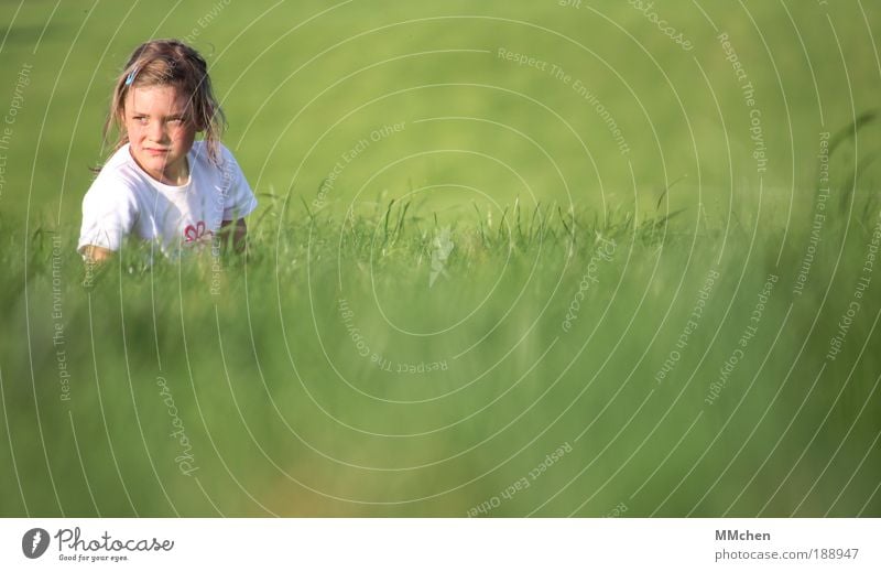 green Meadow Child Girl Green Skeptical Expectation Hope Wait Observe Hiding place Hide disguised Camouflage
