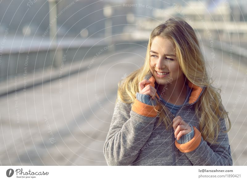 Happy woman with a lovely smile Lifestyle Joy Face Freedom Sun Winter Woman Adults 1 Human being 18 - 30 years Youth (Young adults) Nature Autumn Wind Town