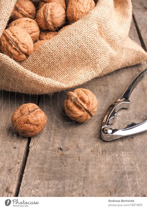 walnuts Food Fruit Nutrition Nature Sack Healthy Delicious brown Snack ingredient raw shell whole nutshell health bag tasty seasonal Walnut Wooden table Rustic