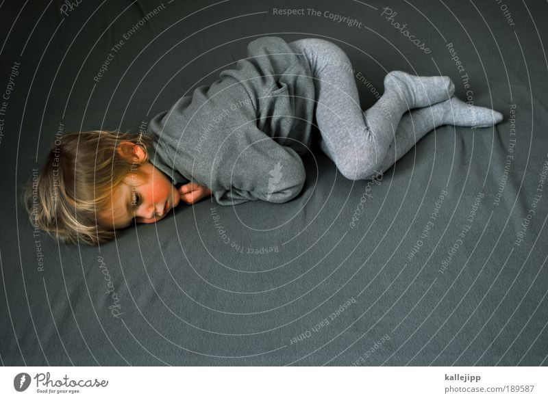 waking Human being Boy (child) Infancy Life Body 1 3 - 8 years Child Sweater Jacket Tights Lie Sleep Looking Dream Sadness Living or residing Gray Compassion