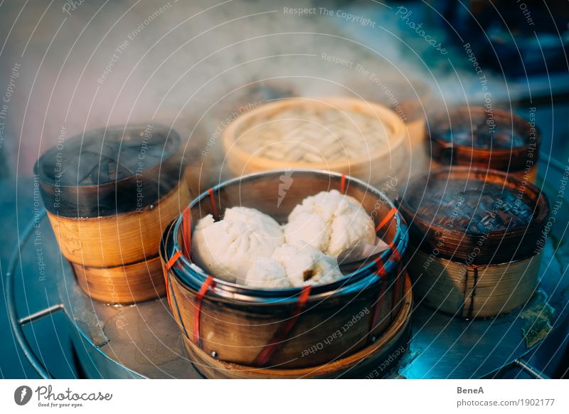 Dumplings in bamboo baskets in Asian street cuisine Food Dough Baked goods Nutrition Fast food Finger food Asian Food Fragrance Exotic Vacation & Travel Baozi
