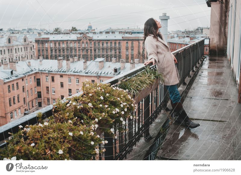 dream on the balcony Feminine Young woman Youth (Young adults) Woman Adults Autumn Rain Flower Pot plant Small Town Capital city Old town Dream house Balcony