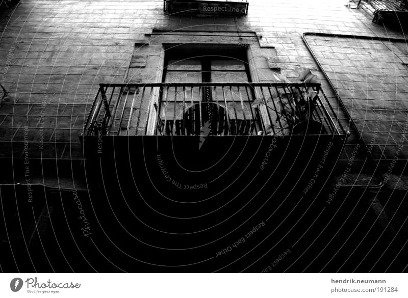 le balcon xy Facade Balcony Old Esthetic Dirty Authentic Original Black Stagnating Symmetry Sadness Decline Change Living or residing Dark Black & white photo