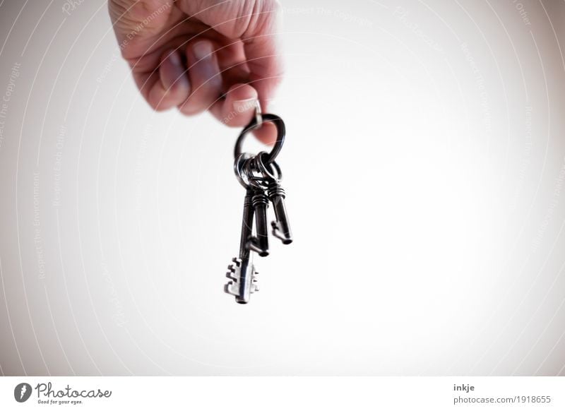 bunch of keys Living or residing Hand 1 Human being Key Hang Old Bright background Unlock Close Retentive Vignetting Colour photo Subdued colour Interior shot