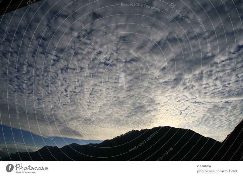 fleecy clouds Clouds Climate change Weather Alps Mountain Blue Energy Moody Surrealism Chur Rhein valley Switzerland cloud pictures saucers Colour photo