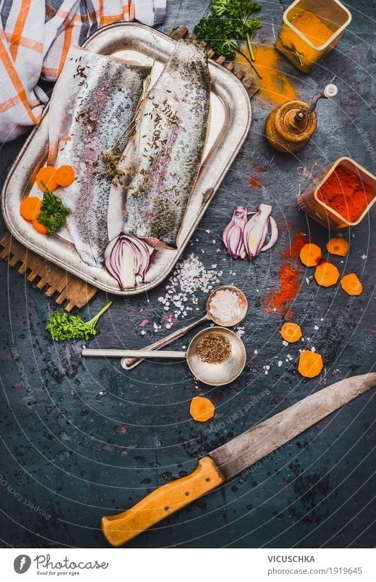 Fish fillets with kitchen knife and spices Food Vegetable Herbs and spices Nutrition Lunch Organic produce Vegetarian diet Diet Crockery Knives Style Design