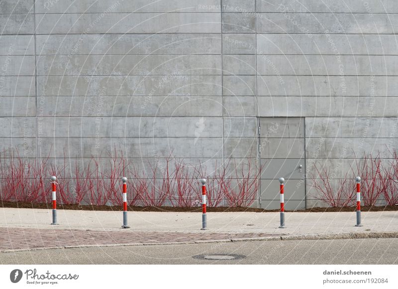 Spring!!! Bushes Facade Door Traffic infrastructure Street Concrete Gray Red Deserted Copy Space top