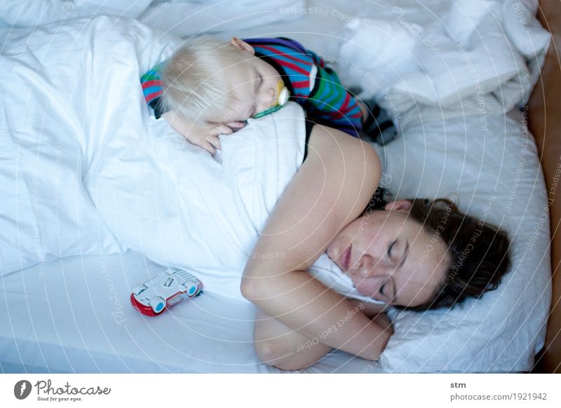 sleeping.... Healthy Living or residing Flat (apartment) Bedroom Child Baby Toddler Woman Adults Parents Mother Family & Relations Infancy Life 2 Human being