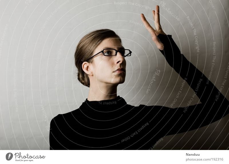 ... Human being Feminine 1 Nerdy Petit bourgeois Person wearing glasses Gesture Hand Demanding Earnest Touch Gloomy Conceited Gray Colour photo Subdued colour