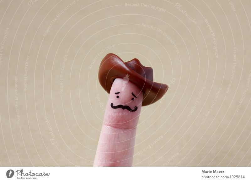Cowboy figure with moustache on fingers Joy Ride Human being Masculine Man Adults Father Face Fingers 1 Laughter Hip & trendy Retro Comic Hero Hipster Western