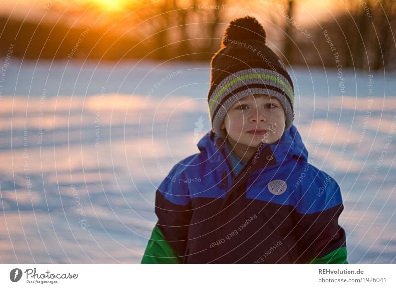 winter sun Human being Masculine Child Toddler Boy (child) Face 1 1 - 3 years 3 - 8 years Infancy Environment Nature Winter Snow Jacket Cap Smiling Cold Small