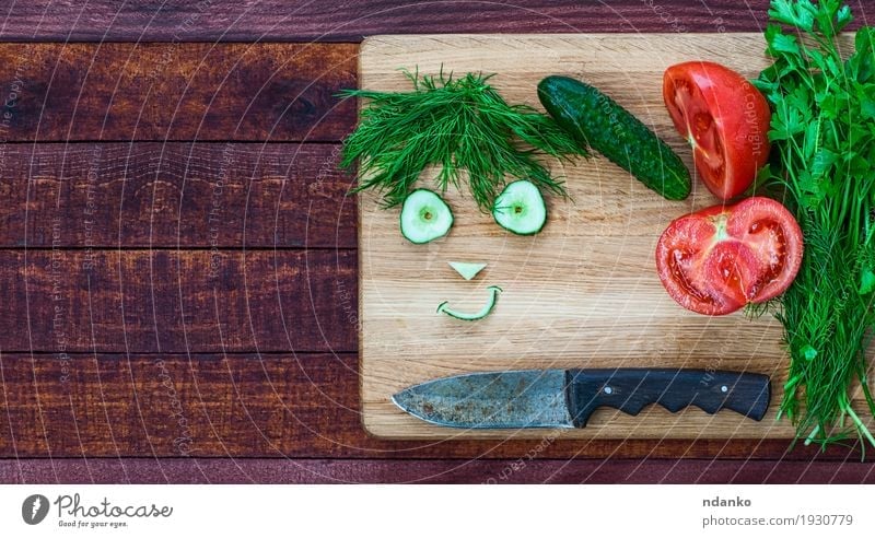 smiley face made of pieces of fresh vegetables Food Vegetable Vegetarian diet Knives Smiling Fresh Delicious Funny Cute Brown Green Red Happiness Humor Tomato