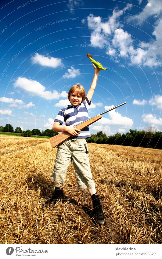 the hunter Masculine Child Boy (child) Infancy Youth (Young adults) 1 Human being Landscape Summer Beautiful weather Field Europe Village Hunting Playing