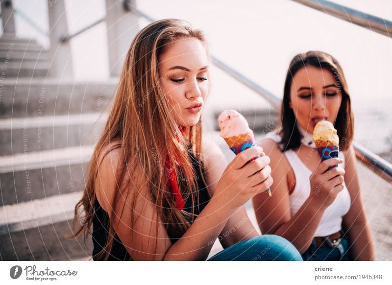 Best friends teenager girls eating ice cream on the beach Food Dessert Ice cream Candy Eating Lifestyle Joy Vacation & Travel Summer Beach Human being Feminine