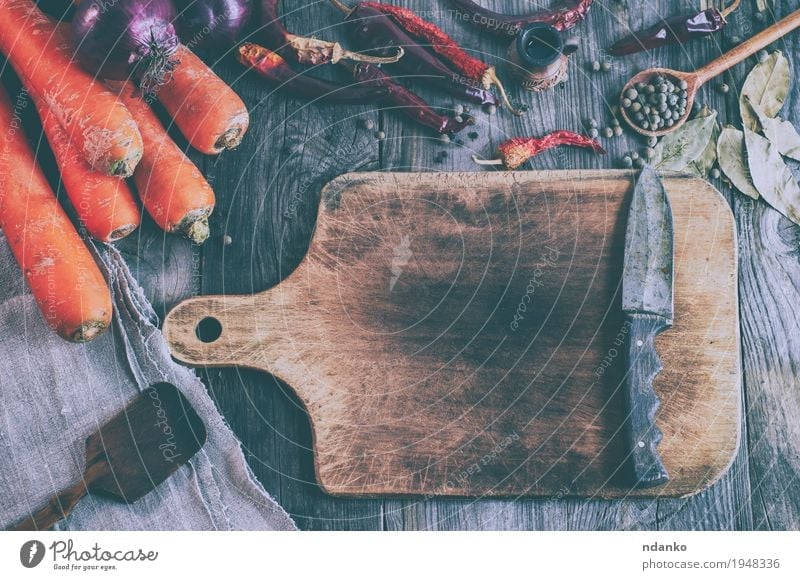 Empty brown cutting board with a knife Vegetable Fruit Herbs and spices Nutrition Vegetarian diet Knives Spoon Table Kitchen Autumn Wood Diet Old Fresh