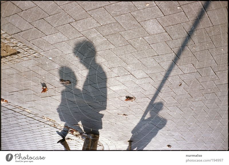 contemplative shadows Lifestyle Style Human being Androgynous 3 Environment Sun Sunlight Climate Weather Beautiful weather Populated Places Marketplace