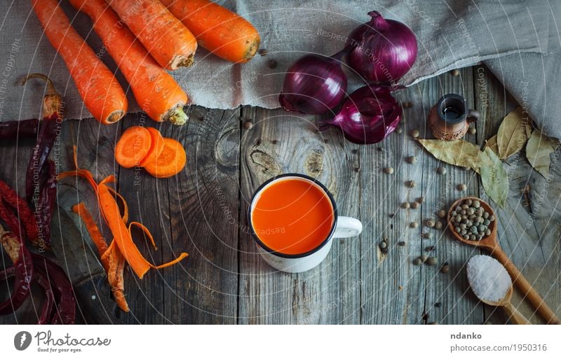 Fresh carrot juice in the iron mug on the kitchen table Vegetable Fruit Herbs and spices Nutrition Eating Vegetarian diet Diet Beverage Juice Cup Mug