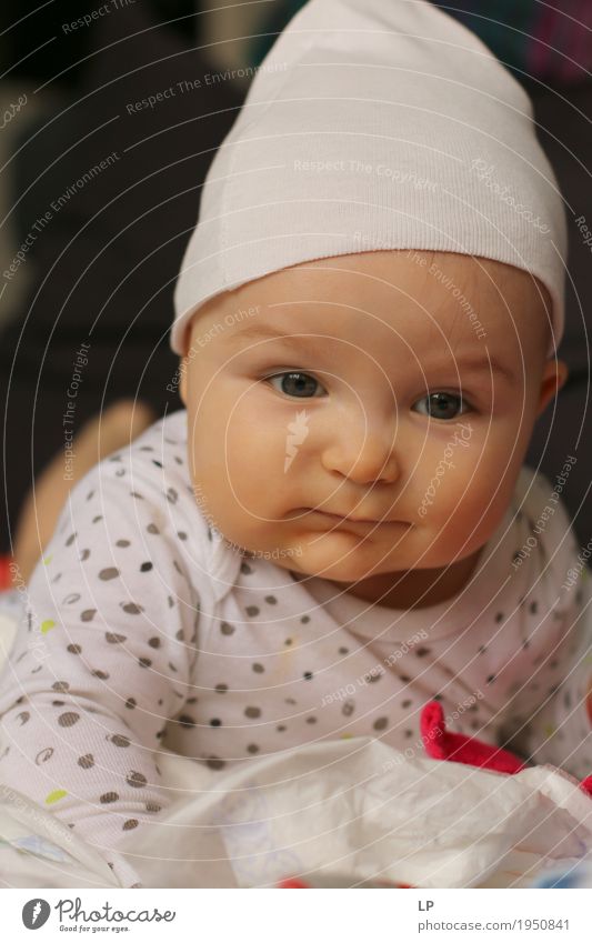 newborn with white hat Parenting Education Kindergarten Human being Child Baby Toddler Parents Adults Brothers and sisters Family & Relations Infancy Life