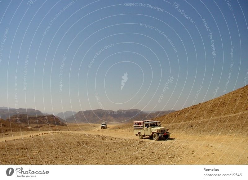 Jeep in the Sinai Desert (2) Offroad vehicle Contentment jeep Stone Sky Sand Far-off places Freedom