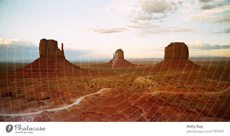 monumental particles Western Nature Landscape Earth Sand Clouds Summer Beautiful weather Warmth Drought Rock Mountain Desert Monument Valley USA Americas Hill
