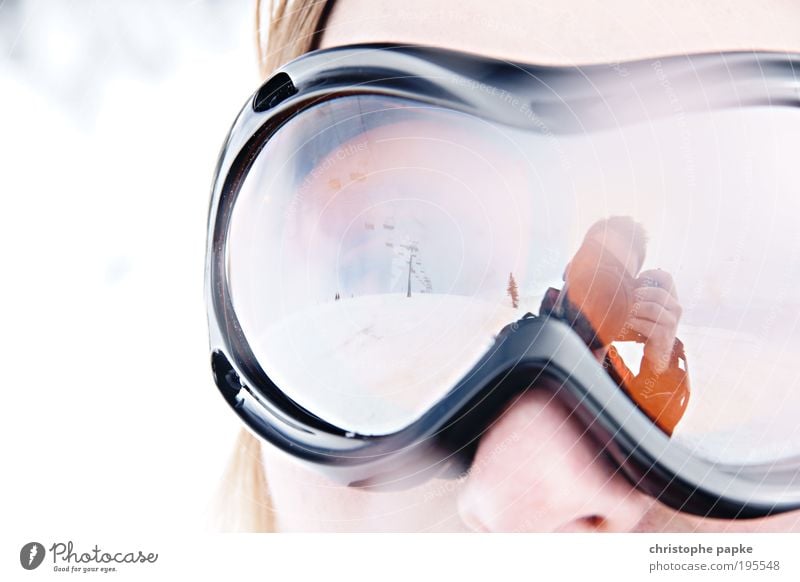 Snow Goggles Winter Winter vacation Mountain Ski run Young woman Youth (Young adults) Brixental Austria Ski lift Sports Athletic Leisure and hobbies