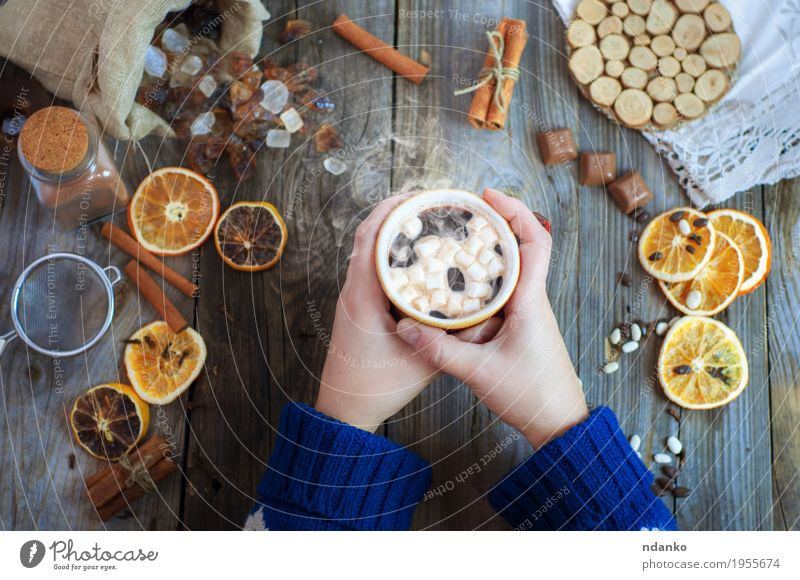 Cup of coffee with sweets Fruit Dessert Candy Breakfast Beverage Hot drink Hot Chocolate Coffee Mug Winter Table Woman Adults Arm Hand 1 Human being