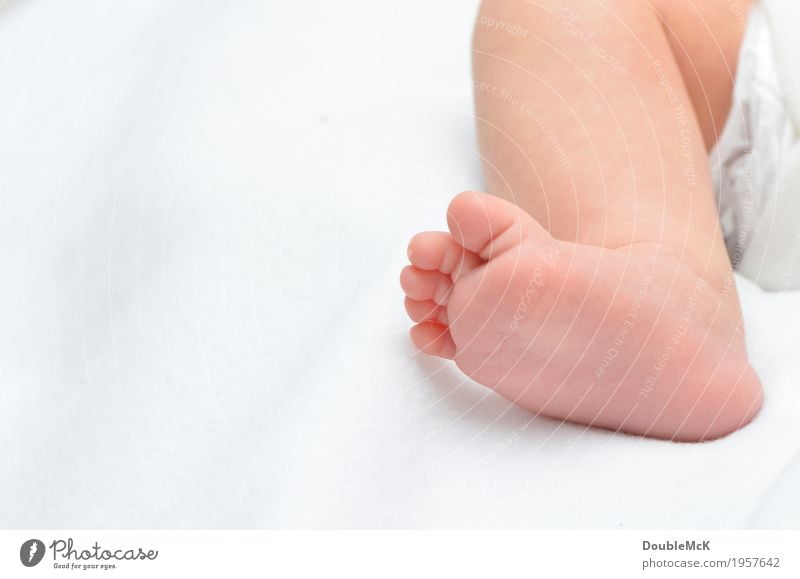 baby foot Human being Baby Skin Legs feet Toes 1 0 - 12 months Lie Small Naked Cute Warmth Pink White Joy Contentment Safety (feeling of) Emotions Infancy
