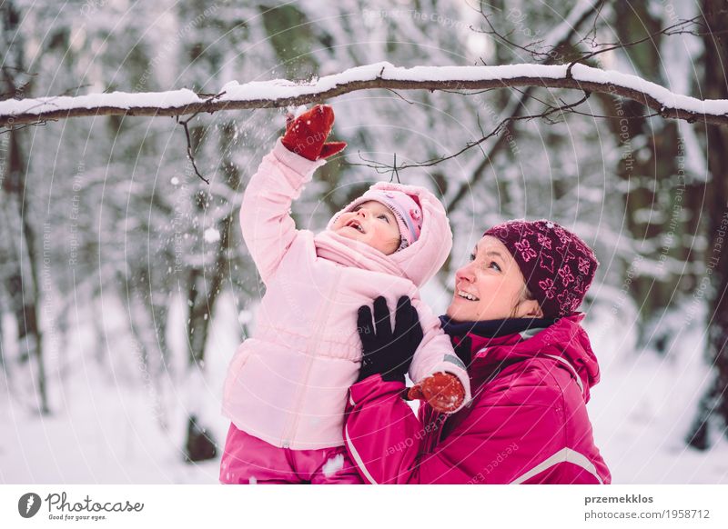 Mother spending time with her children outdoors Lifestyle Joy Happy Vacation & Travel Winter Snow Winter vacation Child Human being Baby Girl Woman Adults