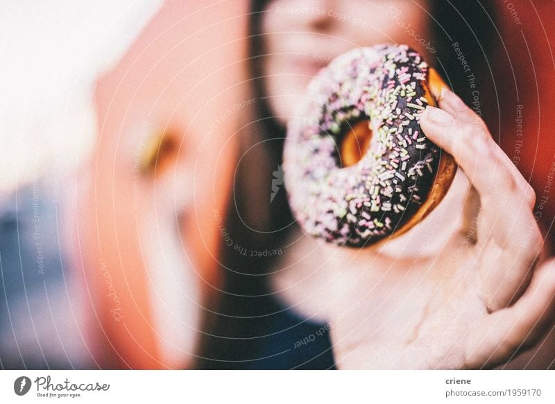 Close-up of women holding chocolate donut in her hands Food Cake Dessert Candy Chocolate Eating Lifestyle Joy Human being Feminine Young woman