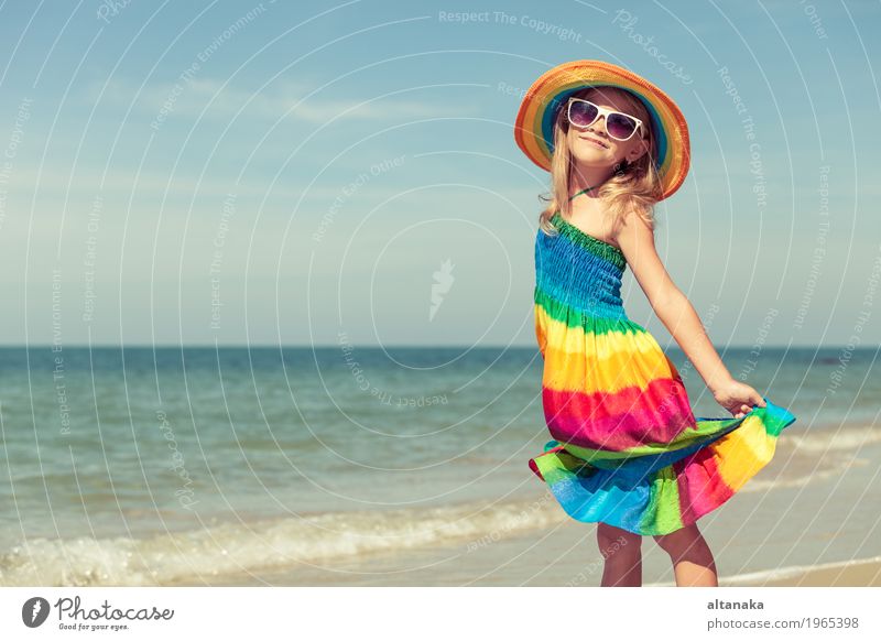 Little girl standing on the beach Lifestyle Joy Happy Relaxation Leisure and hobbies Playing Vacation & Travel Trip Adventure Freedom Summer Sun Beach Ocean