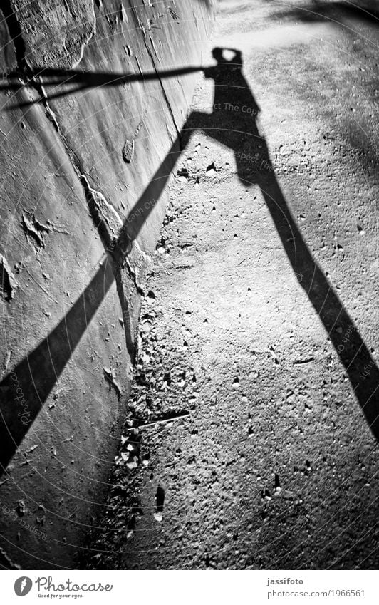 shadow beings Human being 1 Wall (barrier) Wall (building) Creepy Thin Black Surrealism Shadow play Drop shadow silhouette image Existence Mythical creature