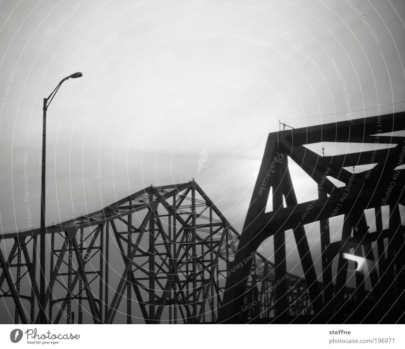 symphony in steel minor New Orleans USA Transport Bridge Dark Steel Steel construction Steel bridge Lantern Apocalyptic sentiment Black & white photo
