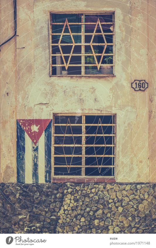characteristics Life Calm Freedom Living or residing House (Residential Structure) Culture Town Outskirts Old town Facade Window Sign Flag Poverty Rebellious
