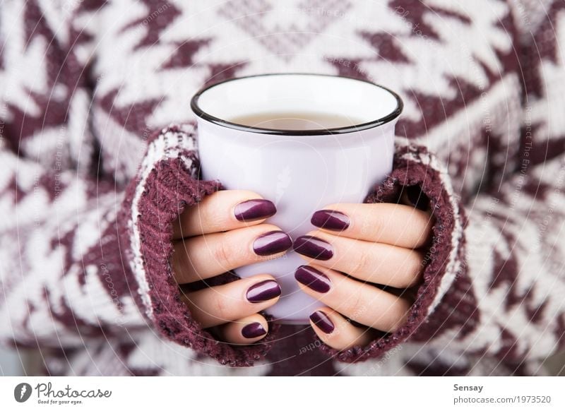 Woman in cozy sweater holding a cup Breakfast Beverage Coffee Tea Knit Winter Human being Girl Adults Hand Warmth Sweater Hot White Hold drink Seasons christmas