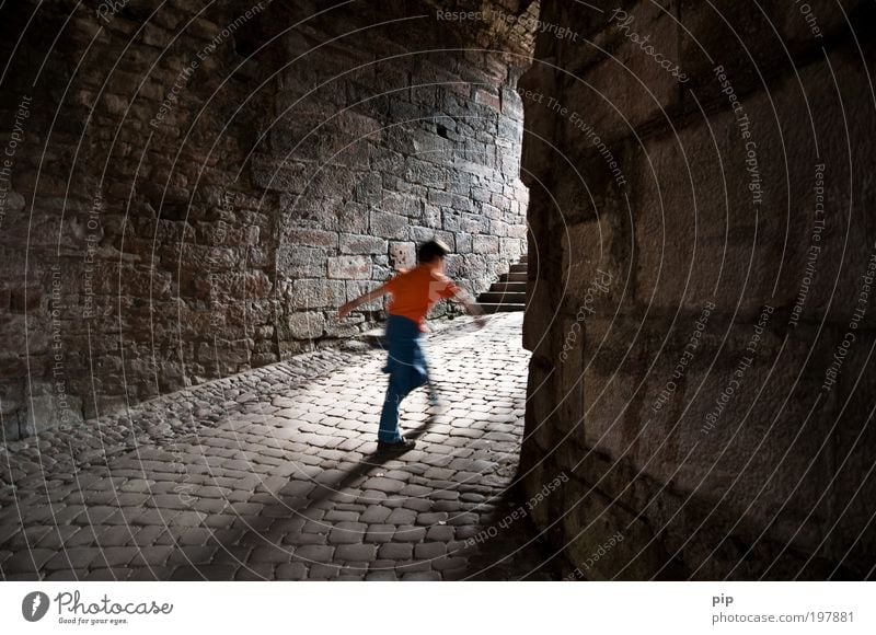 Go spenst Tourism Discover Boy (child) Castle Ruin Tunnel Stone Going Walking Dark Bright Historic Cold Curiosity Speed Gray Fear Dangerous Freedom Hope