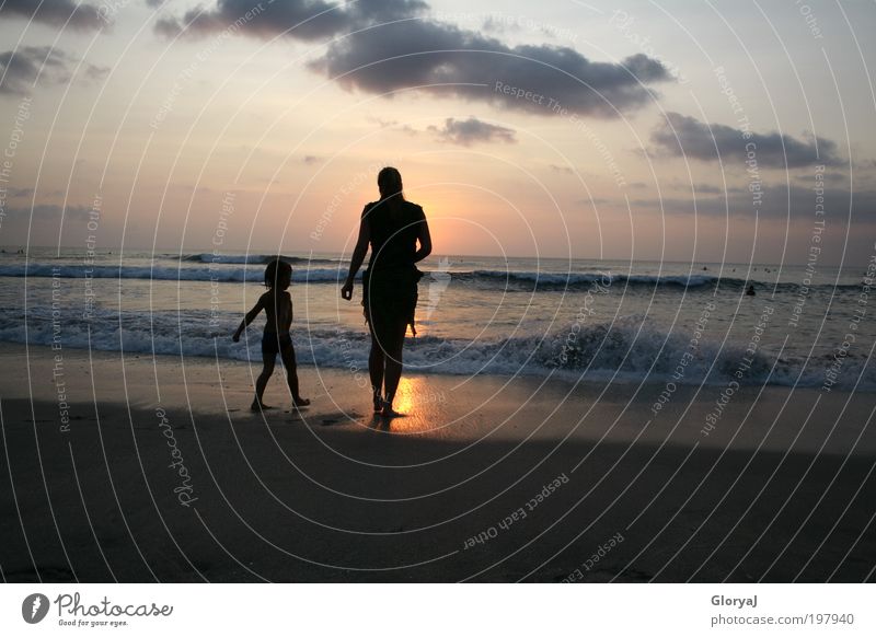 You would shine like the sun Freedom Beach Ocean Child Mother Adults 2 Human being Waves Indian Ocean Island Bali Stand Dream Joy Trust Colour photo