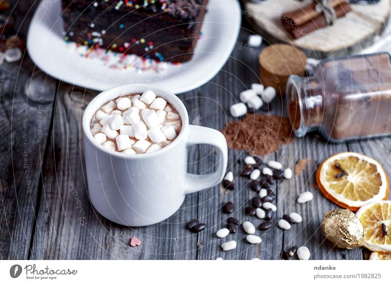 Cocoa with marshmallow on a gray wooden surface Cake Dessert Candy Beverage Hot drink Hot Chocolate Cup Mug Table Wood Eating Drinking Fresh Retro Brown Gray