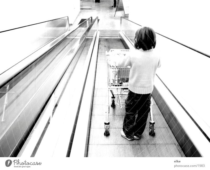 Purchasing sequence 1 Escalator Shopping Trolley Child Push Supermarket Human being Consumption Black & white photo