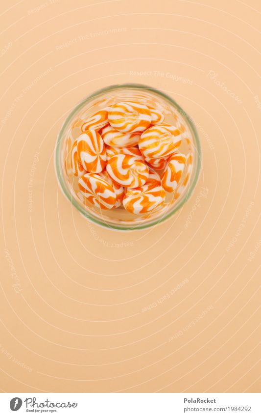#A# Candy Art Esthetic calories Eating Unhealthy Beige Sweet shop Many Delicious Orange Lick Glass Round Colour photo Multicoloured Interior shot Studio shot