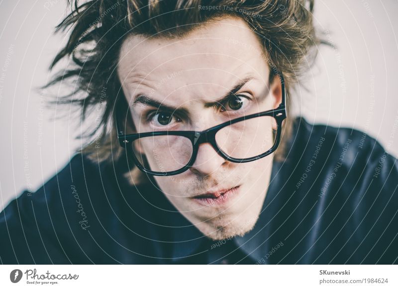 Young nerd with glasses portrait Joy Leisure and hobbies Playing Entertainment Technology Human being Man Adults Hand Fingers Old Observe Funny Retro Crazy Red