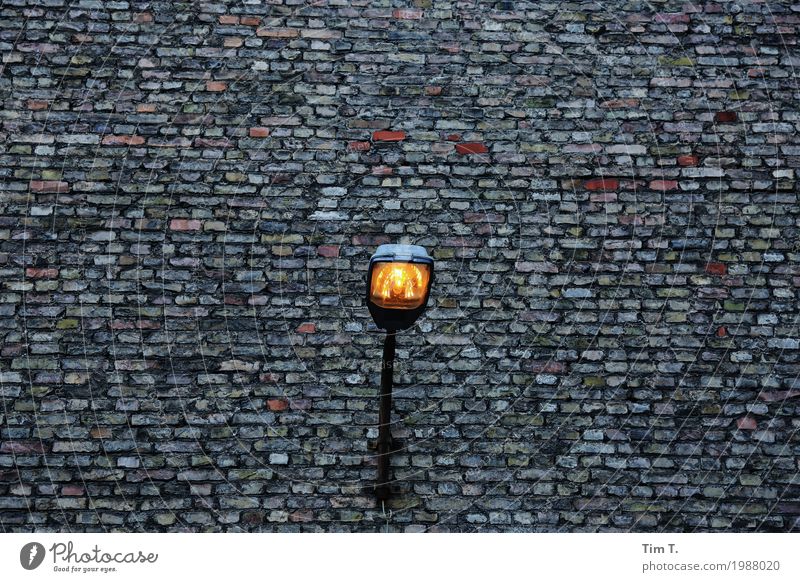ray of hope Capital city Downtown Old town Deserted House (Residential Structure) Facade Design Lantern Lamp Wall (barrier) Colour photo Exterior shot