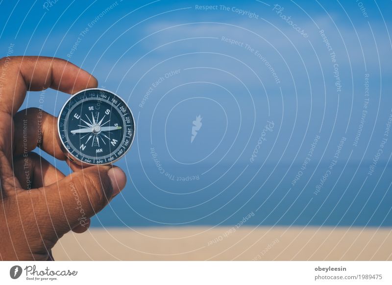 Hand with compass at the beach Human being 1 30 - 45 years Adults Art Artist Nature Landscape Sand Beach Ocean Adventure Colour photo Multicoloured Morning