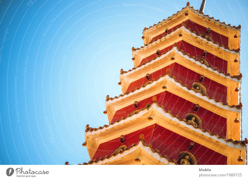 High tower of asian temple Face Harmonious Tourism Art Culture Nature Sky Building Architecture Monument Old Historic Funny Red Wisdom Peace Religion and faith