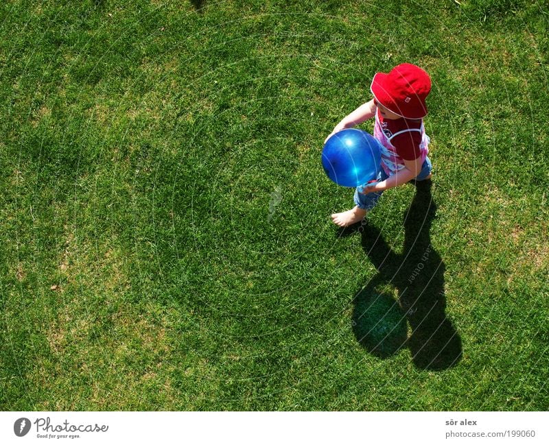 Got the balloon'g Playing Toddler Girl Infancy 1 Human being Spring Beautiful weather Grass Garden Meadow T-shirt Jeans Cloth Hat Balloon Going Smiling Laughter