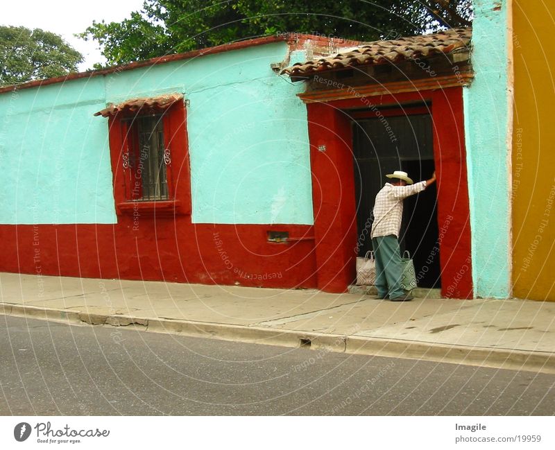 Con tiempo Neighbor House (Residential Structure) Multicoloured Man Mexico Hat Door
