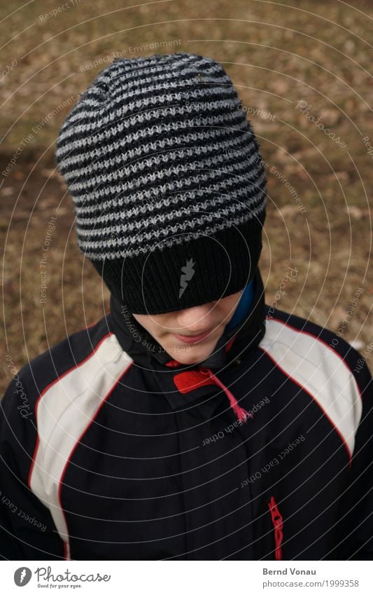 Monday cap Human being Child Head 1 Smiling Looking Hide Masked Face Cap Jacket Black Red Blind Playing Unidentified Stripe Striped Colour photo Exterior shot