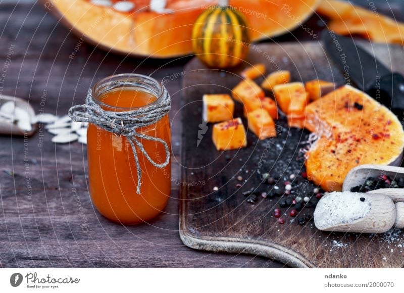 Freshly made pumpkin juice in a glass jar Vegetable Herbs and spices Beverage Juice Table Wood Natural Orange Slice sweet Organic drink Home-made Seasons Tasty