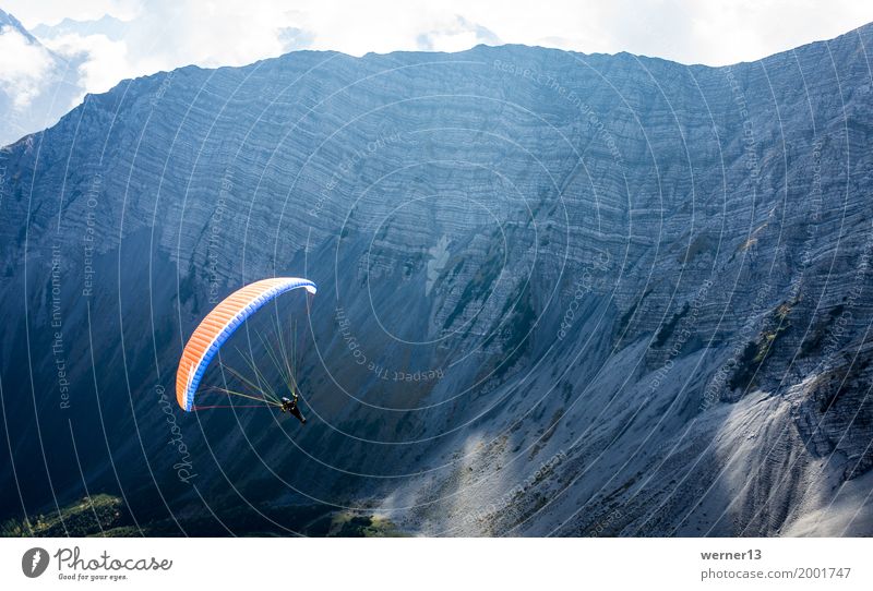 Paragliding in the Alps, Lermoos, Zugspitzarena Leisure and hobbies Tourism Flying 1 Human being Nature Landscape Air Autumn Rock Mountain Peak Hiking Authentic